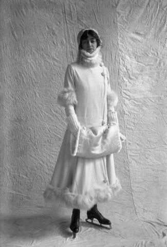 Studio shot of woman wearing ice skates